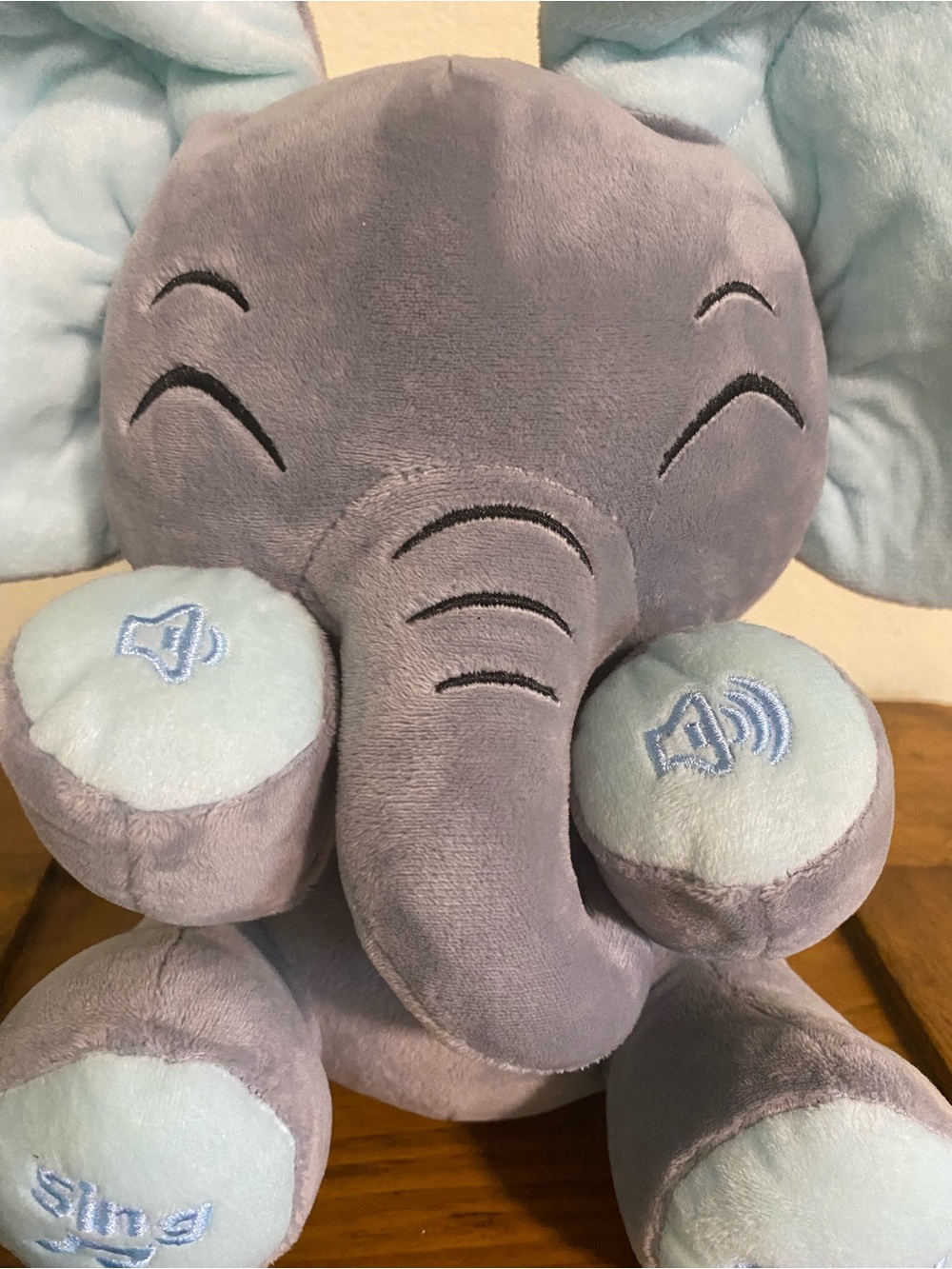 Floppy eared interactive Grey Elephant Stuffed Animal Ears flops and plays music